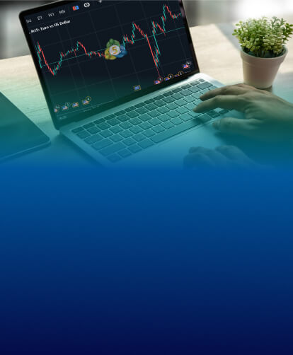 laptop looking at graphs
